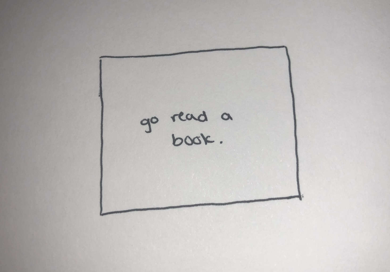 a drawing of a webpage where only the text 'go read a book.' can be seen.